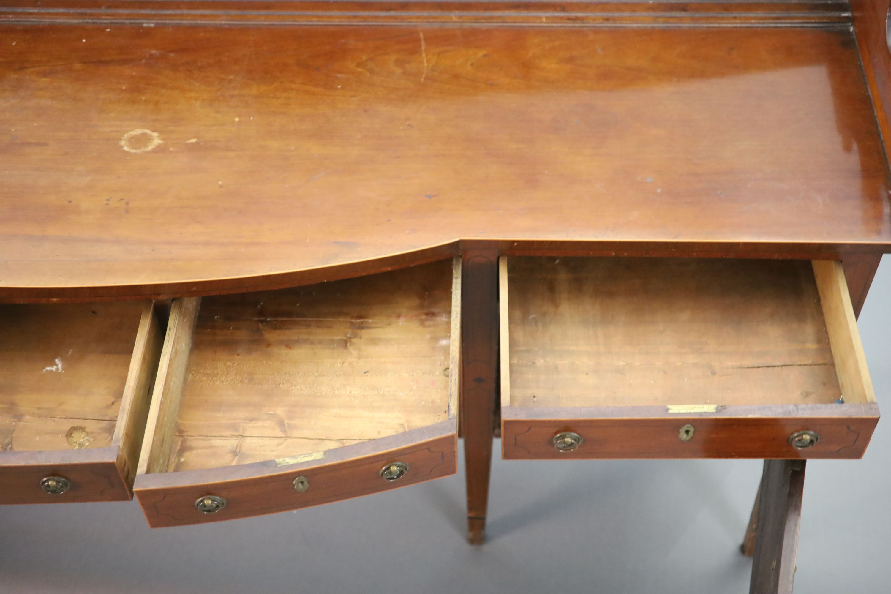 A Regency boxwood strung mahogany bowfront sideboard, W.241cm D.63cm H.118cm